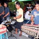 Street performers Parked motorbikes along Malioboro Street, Yogyakarta, Indonesia