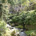 Gunung Kawi is located at the bottom of a valley.
