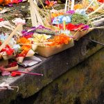 People say their prayers accompanied by some graceful hand gestures before laying their offerings.