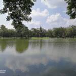 Ancient ruins viewed across a lake