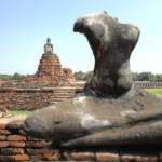 Buddha statues seated on pedestals