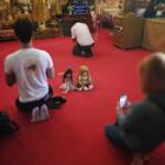 There were a lot of people offering prayers in the temple during our visit