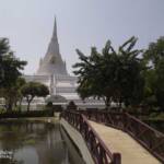 Bridge leading to white chedi