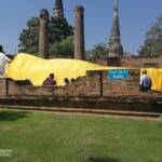 Large Reclining Buddha draped in gold cloth