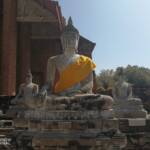Sitting Buddha with gold sash