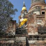 One of two Buddha's guarding the entrance to Wat Yai Chai Mongkhol's main temple