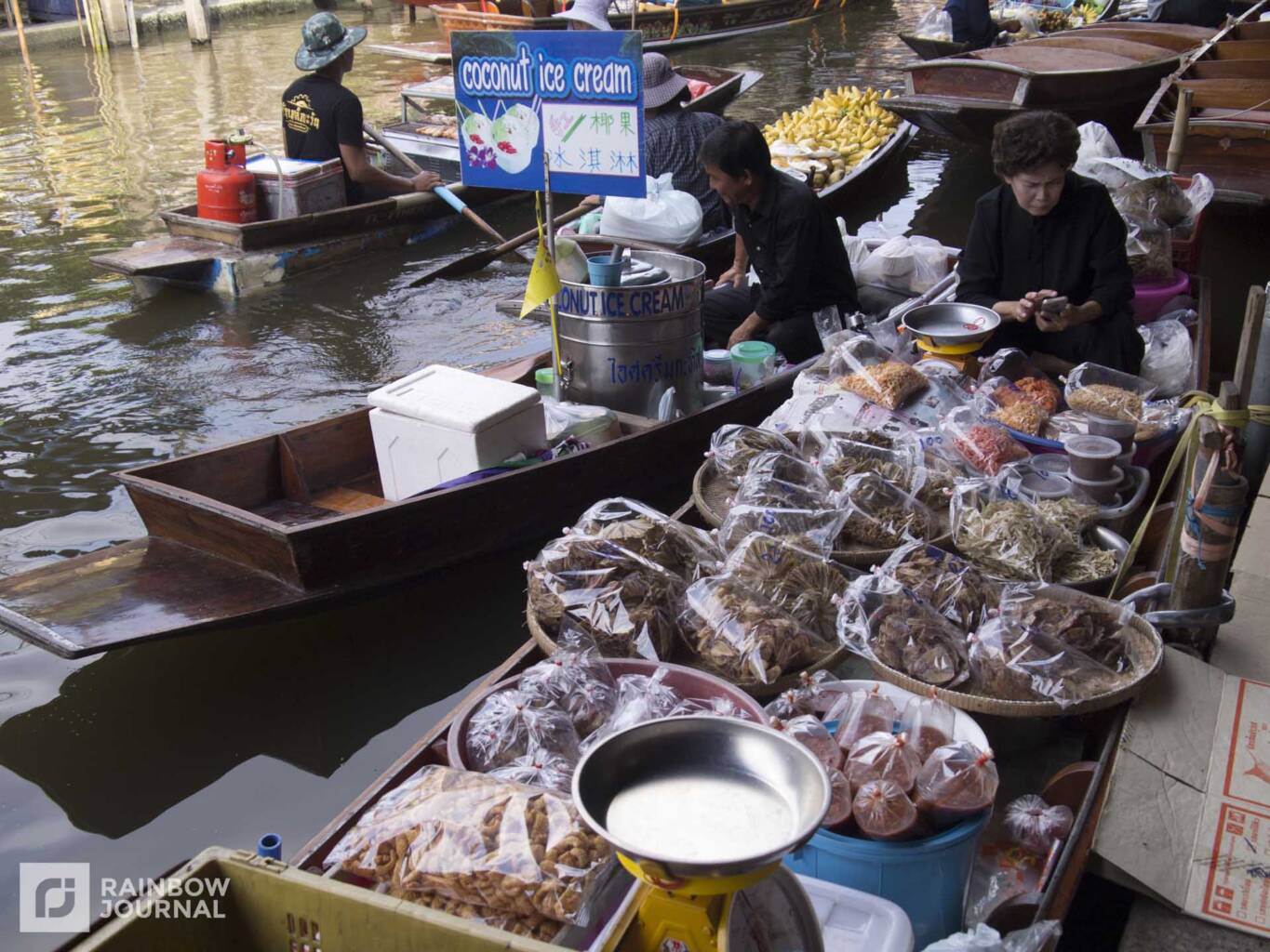 Hawkers selling products from their boats