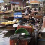 Hawkers on boat selling products