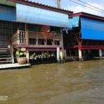 Houses sitting alongside a canal