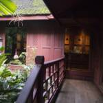 Hallway leading to an open door