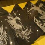 Artwork depicting a man and a tiger