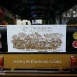 Back of shuttle seat with image and website info